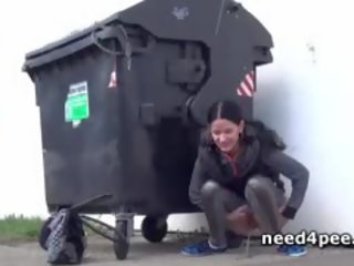 Playful Redhead Pissing In A Empty Pool