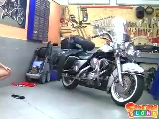Concupiscent blonde teen with small tits stripping by the motor bike