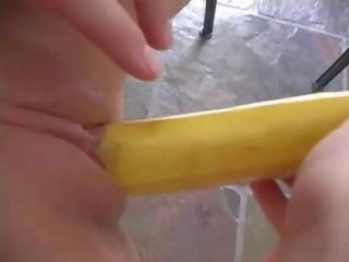 Shaved pussy having fun with a bannana movie